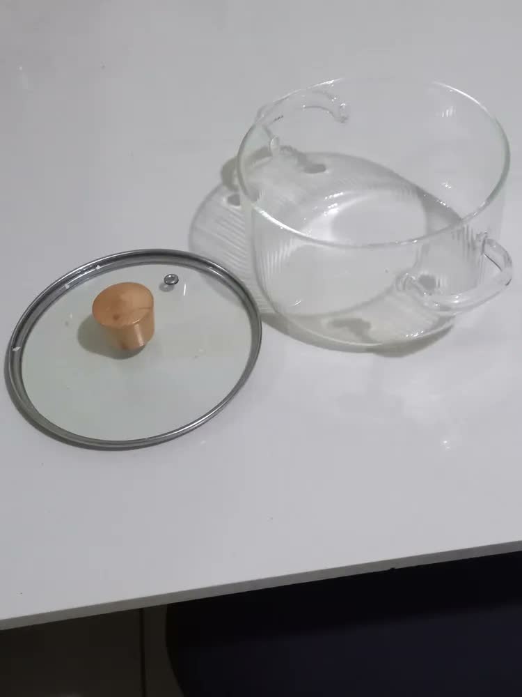foto de Panela De Vidro Com Tampa Para Cozinhar Lentamente